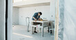 © peopleimages.com - Man, carpenter and sanding for construction with wood, restoration and furnishing for expansion. Male person, sandpaper and timber at site for carpentry, smooth surface and woodworking for renovation