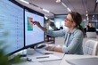 © Andrey Popov - Young Business Analyst Reviews Risk Data On Computer