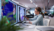 © Andrey Popov - Young Woman Studies Cyclone Forecast Map