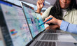 © Andrey Popov - Two Women Analyze Financial Charts On Laptop