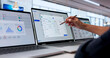 © Andrey Popov - Woman Uses Laptop To Manage Employee Payroll