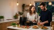 © Mohd Faisal Khalid - Joyful couple preparing delicious food together in a modern kitchen