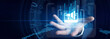 © NexPix - Marketing director shown by tracking online Digital Marketing campaign metrics and social media engagement graphs on a transparent interactive tablet. Global brand awareness and strategy.