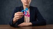 © Stock iT - Professional business woman holding linked male and female gender symbols representing equality and inclusion concept