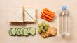 © happie - Flat lay school lunch with sandwich triangles and vegetables – Ideal for meal planning, back to school marketing, or kids nutrition.
