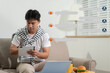© NINENII - Smart AI Chatbot, man engaging in online conversation with AI assistant.