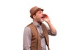© Ernest - Man wearing a traditional hat holds his hand near his mouth and loudly calls someone.
