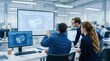 © Lamduan - Technical designs displayed on computer screens as a group of engineers collaborate in a modern office