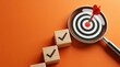 © Touch Heart Photo - Achieving goals through success steps represented by wooden blocks and a target with a dart.