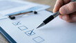 © Nati - Closeup pen completing checklist busines 1