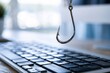 © Daria - Concept of cybercrime and online fraud with a metal fishhook hovering above a computer keyboard symbolizing digital phishing attacks and scams