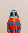 © Breezze - Anthropomorphic rabbit wearing a chunky striped cardigan and headphones, featuring soft brushed fur and round spectacles for quirky music branding