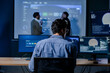 © SAT65 - AI Engineer Monitoring Machine Learning System Performance, Reviewing Model Metrics Across Multiple Screens. Software Developer Working at Multi Monitor and Analyzing Artificial Intelligence System.