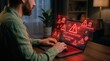 © Amonrat - Laptop displaying a scam message alert during a work session in the evening