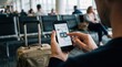 © Tonton1541 - AI Travel Planning Mobile App concept. Person using smartphone app to check flight status in an airport waiting area
