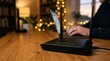 © Masque - WiFi router with dual antennas and glowing green lights on a wooden desk