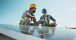 © peopleimages.com - Technician, team and outdoor at solar panel with tablet, planning upgrade or innovative design. Men, talking and tech with photovoltaic grid for project management with energy source at eco building