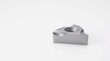 © UmaimaGFX - Industrial carbide turning insert features sharp metallic edges and precise geometric grooves for heavy duty metal machining and lathe work