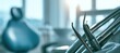 © Kelapa - Close-up on dental tools and chair in a bright, modern clinic