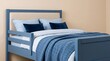 © Aicha - Modern Wooden Kids Bed Frame with Blue Bedding and Safety Rail