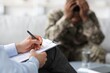 © Prostock-studio - Worried Black Male Veteran Engaging In Therapy Session With Professional Therapist, Addressing Mental Health Issues At Office Setting, Seeking Support During Difficult Times. Healthcare Concept.