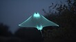 © NurAisyah - A majestic bioluminescent manta ray glowing in dark ocean waters, showcasing ethereal underwater beauty.
