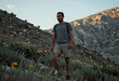 © Pixel-Shot - Adventure travel and exploration, man hiking on mountain trail during summer vacation for wellness and active lifestyle in nature with scenic landscape