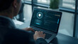 © happy - Coding the Future: A focused professional works diligently on a laptop, displaying a futuristic interface with code and data visualization, symbolizing innovation and digital progress.