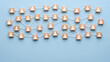 © Rafli - Interconnected Wooden Blocks with User Icons Symbolizing a Vast Social and Professional Network Grid Concept