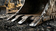 © Jihad - Close-up of tractor treads in muddy field