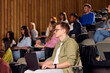 © Boris Jovanovic/Stocksy - Students Sit a Lecture at the University.