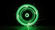 © Aisyah - Long exposure light painting showing green concentric circular streaks with white sparks on a black background, created by a rotating light source over a reflective floor.