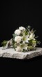 © flavia - Elegant white flower bouquet with lilies carnations and greenery on stone slab