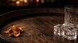 © Ahasan - Crystal glass of whiskey with ice cubes and dried orange peel on a dark rustic wooden barrel surface, moody bar atmosphere, close up shot