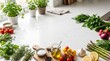 © WOWA - Fresh organic ingredients for cooking on a bright kitchen counter with herbs vegetables and seasonings