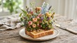 © singgih - Colorful Fresh Flower Bouquet on Toasted Bread Plate.
