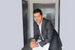 © Arlette - 40-year-old Latino executive with a dark skin, successful leader of his business and finance venture