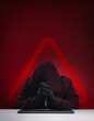 © tete_escape - Hooded cybercriminal anonymous behind keyboard with red warning symbol and binary code background. Account takeover fraud, stolen credentials, phishing and unauthorized digital access concepts.