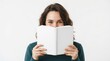 © BlackBird Studio - Young Woman Holding a Book and Smiling Happily