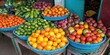 © sawaratch - Colorful assortment of fresh fruits and vegetables showcased at a bustling local market stand
