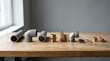© Colorium Studio - Various plumbing pipes and metal fittings arranged on a rustic wooden table for home repair projects. easy pipe assembly