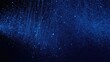 © Worldwide - Dense blue glowing particle field falling on a dark background. Sparkling stardust texture for cosmic banners, night sky visuals and futuristic data design
