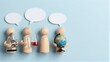 © joeycheung - Four wooden figures hold science tools, symbolizing global collaboration and discovery.