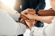 © William - Diverse Business Team Stacking Hands Together for Teamwork and Support