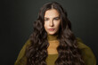 © millaf (Nemchinova) - Fashion portrait of long hair woman classic hairs curly. Brunette model with wavy hair looking at camera