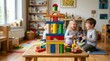 © olga_demina - A tall wooden block tower sits on a low table in a bright kindergarten room while cheerful children play in the background, creating a joyful and engaging learning atmosphere