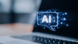 © Rosi - An AI speech bubble displayed beside a laptop represents artificial intelligence communication virtual assistance and automated digital interaction.