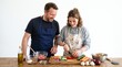 © Segati - Father and daughter happily cooking together in a kitchen preparing healthy vegetables