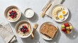 © NextGen Canvas - Healthy breakfast meal with oatmeal bowls berries hard boiled eggs toast and fresh fruit salad plate. nut free meal plan