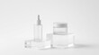 © rezaul4022 - Cosmetic skincare bottles on clear glass pedestals minimalist white background mockup